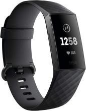 Fitbit band with digital screen showing the time