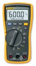 Yellow and gray fluke multimeter with a central dial, buttons, and outlets