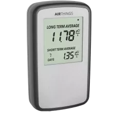 Radon detector with long term average reading and short term average reading displayed on a digital screen