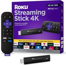 Roku streaming stick and remote by purple box