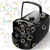 black bubble machine with iridescent bubbles coming out 